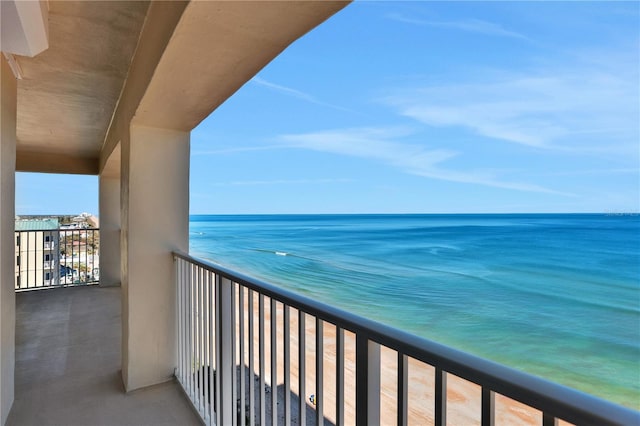 balcony featuring a water view