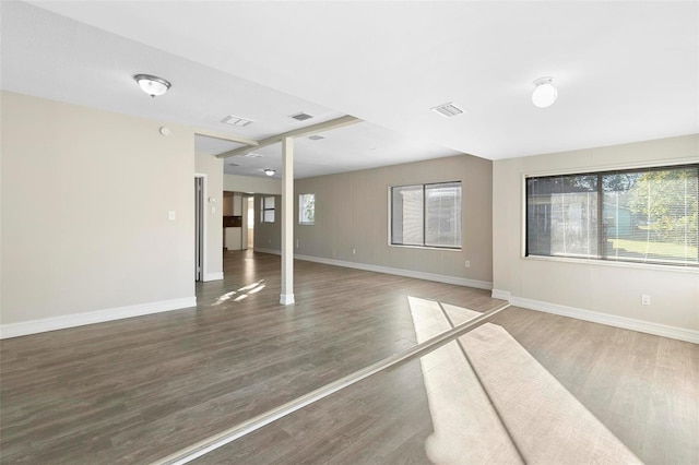 unfurnished room featuring hardwood / wood-style floors