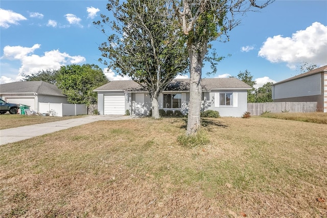 view of front facade featuring a front lawn and a garage