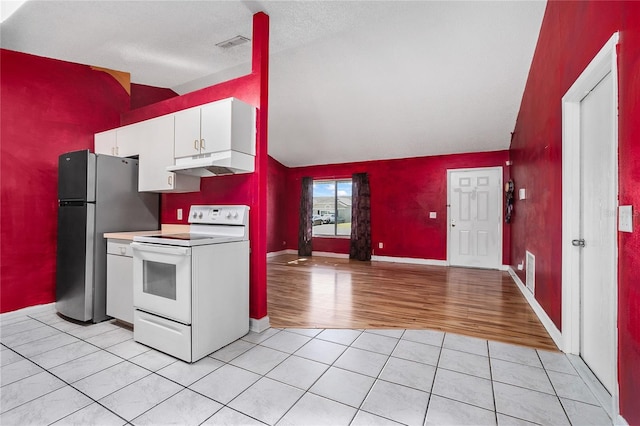 kitchen with lofted ceiling, white cabinets, electric stove, light wood-type flooring, and a textured ceiling