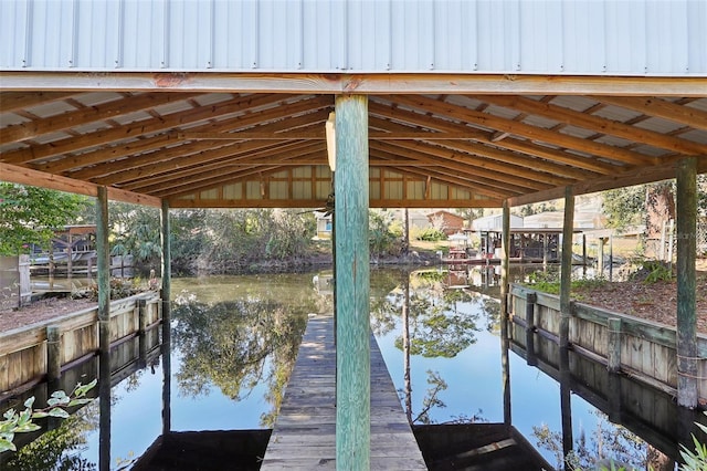 dock area featuring a water view