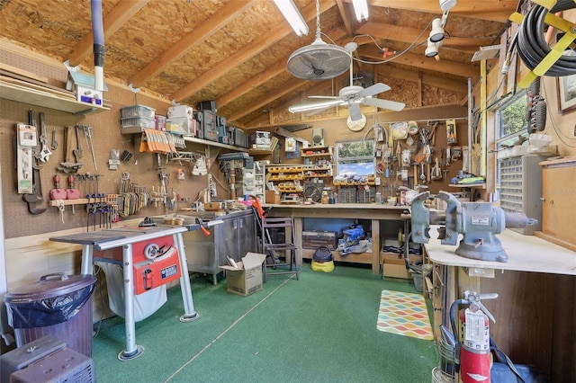 miscellaneous room with a workshop area, ceiling fan, and lofted ceiling