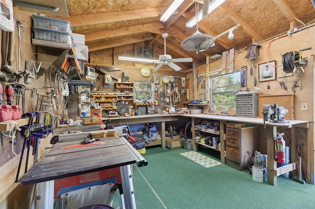 misc room featuring a workshop area, ceiling fan, and lofted ceiling