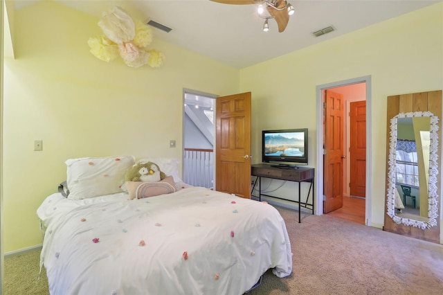 bedroom featuring light carpet and ceiling fan