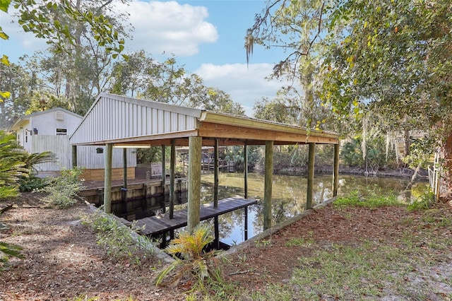 dock area featuring a water view