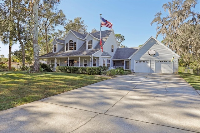 cape cod house featuring a front yard, a porch, and a garage