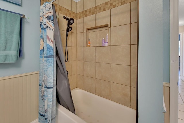 bathroom featuring shower / bath combo with shower curtain