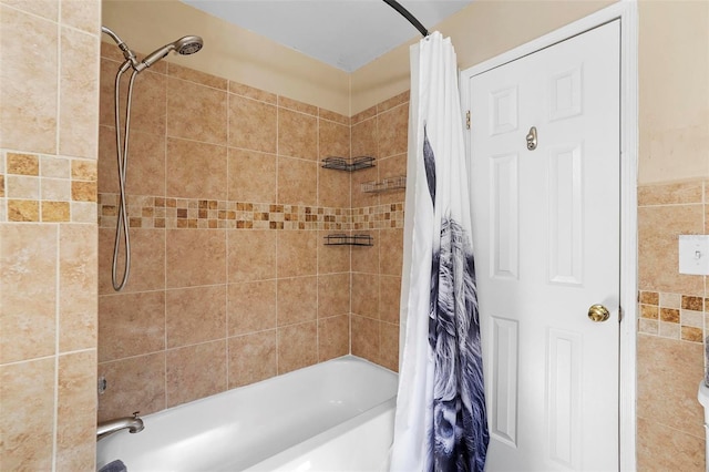 bathroom featuring shower / bathtub combination with curtain