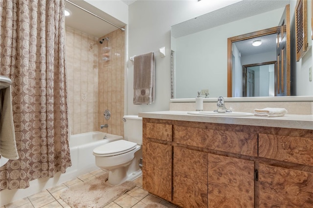 full bathroom featuring tile patterned flooring, vanity, shower / tub combo with curtain, and toilet