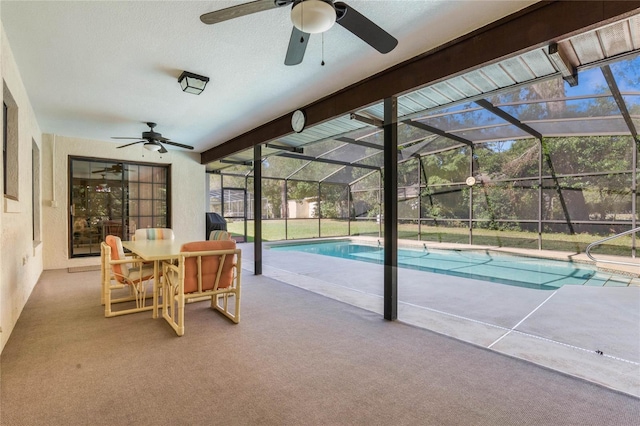 view of pool with ceiling fan