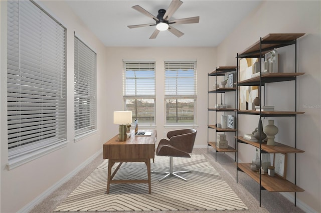 home office with light colored carpet and ceiling fan