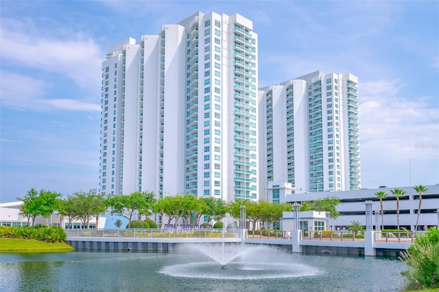 view of building exterior with a water view