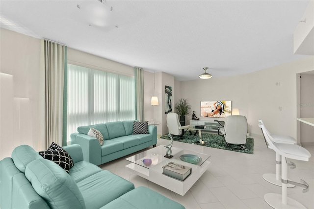 living room featuring light tile patterned floors