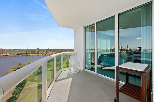 balcony featuring a water view