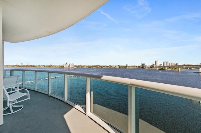 balcony featuring a water view