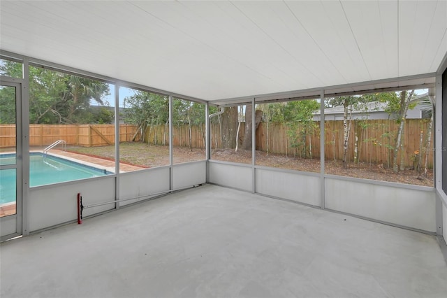 unfurnished sunroom featuring a wealth of natural light