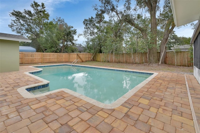 view of pool with a patio area