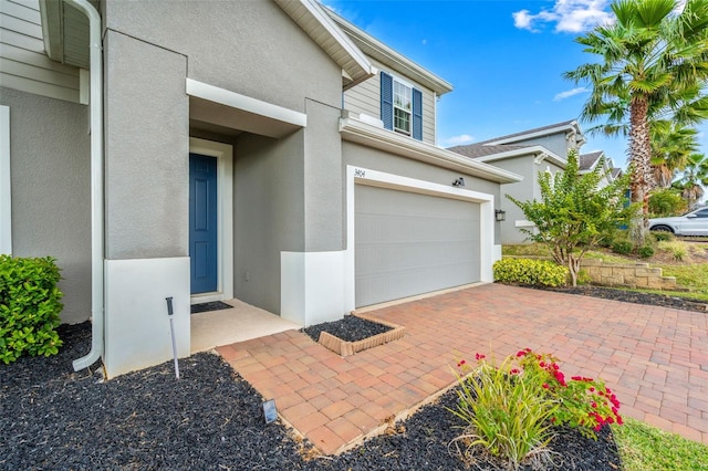 view of property exterior featuring a garage