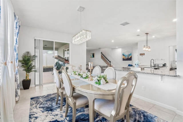 dining room featuring light tile patterned flooring