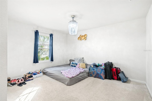 bedroom with light colored carpet