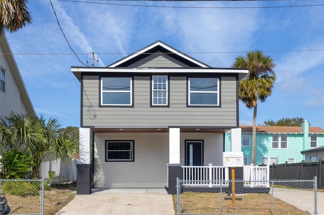 view of front of property featuring covered porch