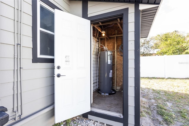 view of exterior entry with water heater