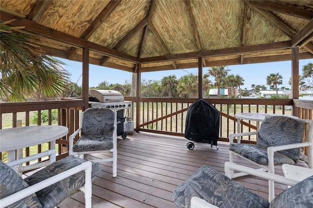 deck featuring a gazebo and a grill