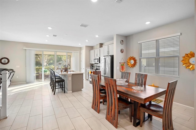 dining space with sink