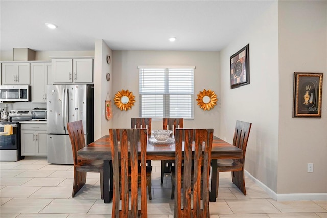 view of tiled dining space