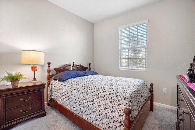 bedroom with light carpet