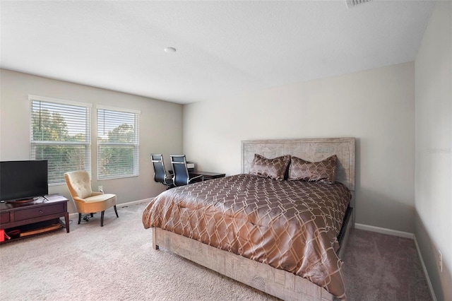 bedroom featuring carpet