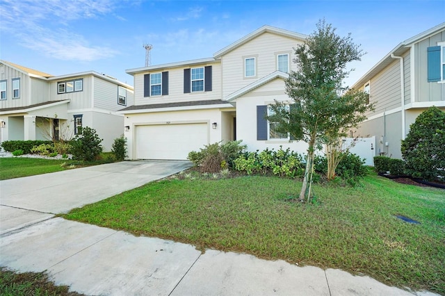 view of front facade with a front yard and a garage