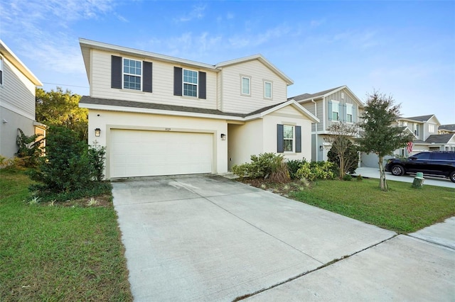 front facade with a front yard and a garage