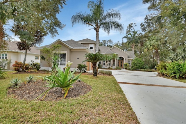 view of front of property with a front lawn