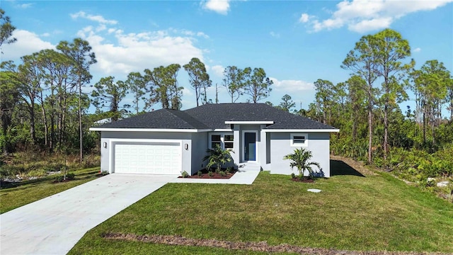 ranch-style home featuring a front lawn and a garage