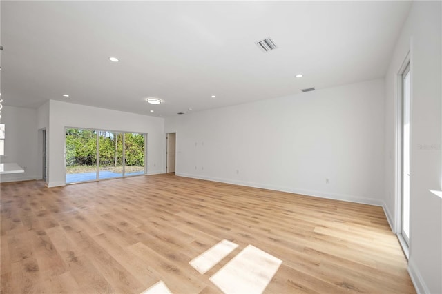 empty room with light wood-type flooring