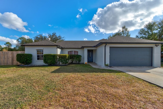 ranch-style house featuring a garage and a front lawn