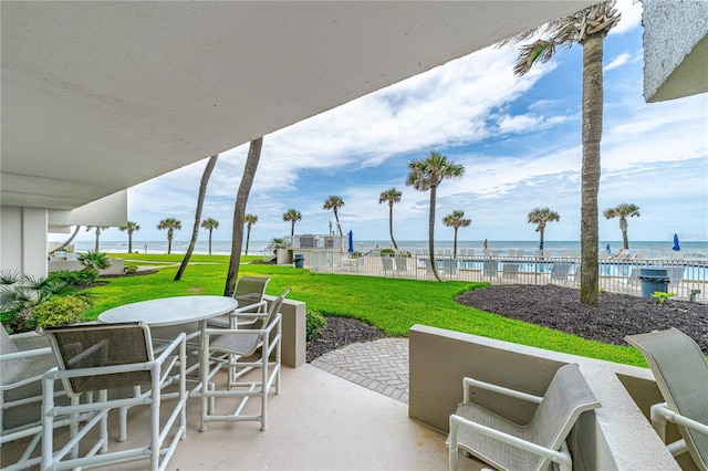 view of patio featuring a water view