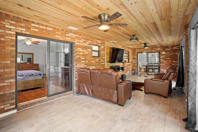 1195 Glen Royal Ter, Deland, FL 32720 - living area featuring ceiling fan, brick wall, wood ceiling, and wood finished floors