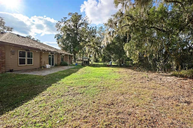 1195 Glen Royal Ter, Deland, FL 32720 - view of grassy yard with a patio area
