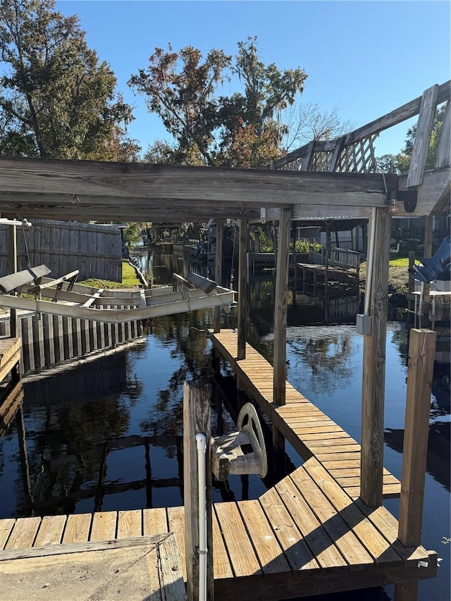 view of dock with a water view