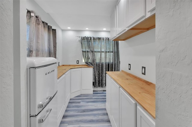 bathroom featuring hardwood / wood-style flooring