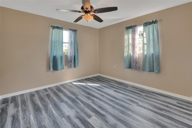 unfurnished room featuring ceiling fan and wood-type flooring