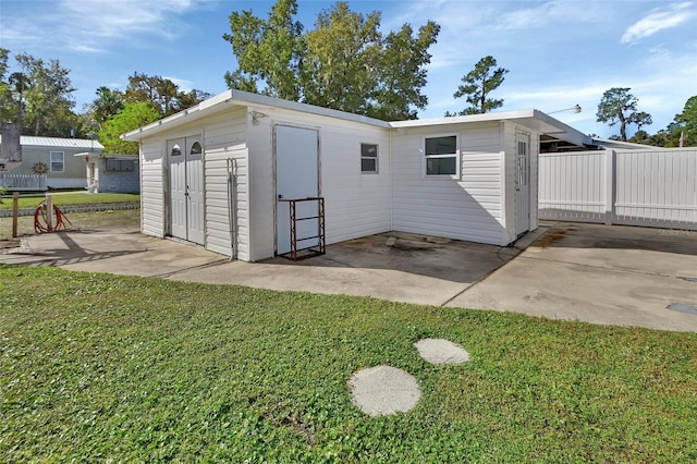 exterior space with a patio area and a yard