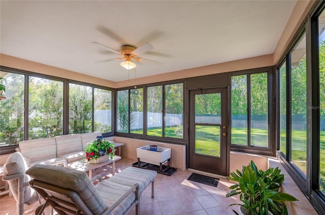 sunroom / solarium with ceiling fan