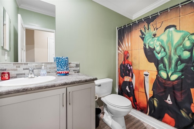 bathroom with vanity, backsplash, wood-type flooring, and ornamental molding