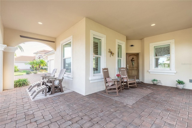 view of patio featuring a porch