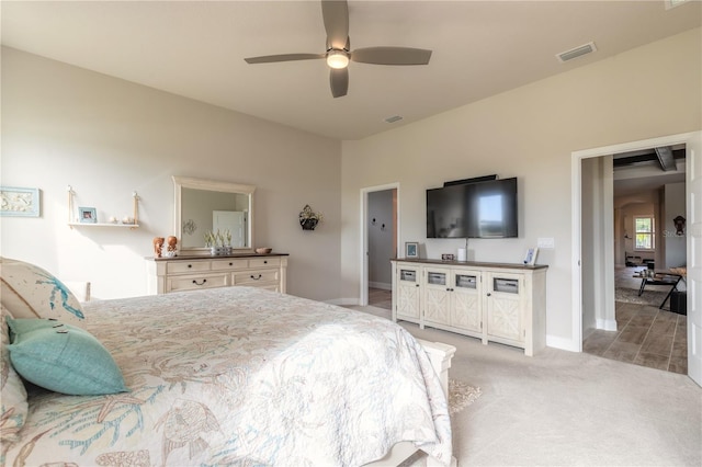 carpeted bedroom with ceiling fan