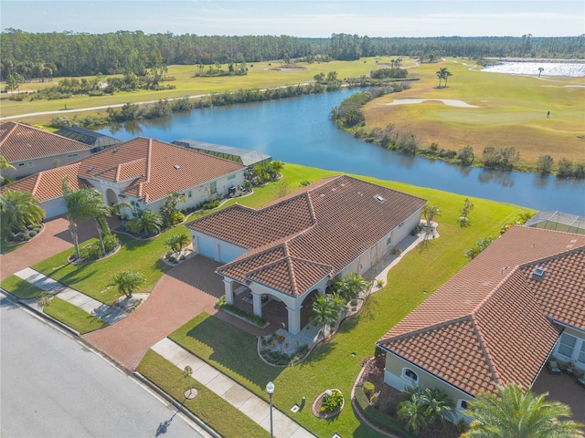 drone / aerial view with a water view