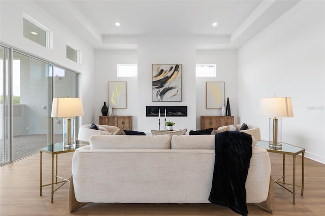 living room with hardwood / wood-style flooring and plenty of natural light